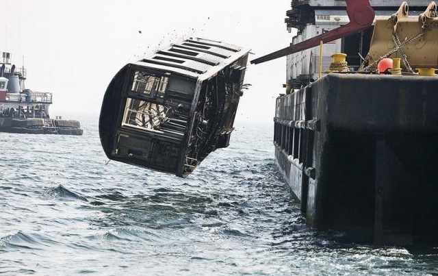 Subway cars are dumped into the sea