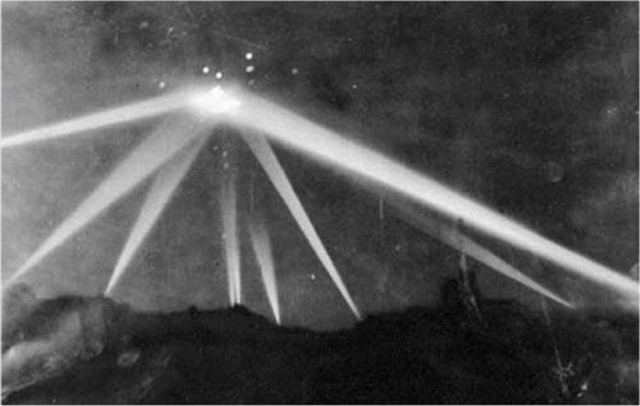 Searchlights focus on an unidentified object over Los Angeles