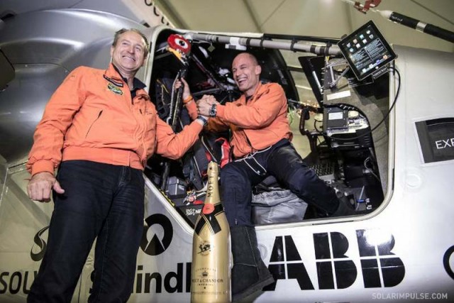 André Borschberg greets pilot Bertrand Piccard