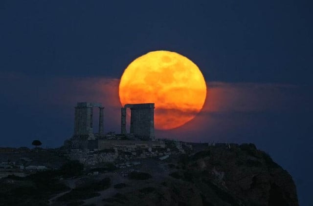 Moon rising over the Temple of Poseidon