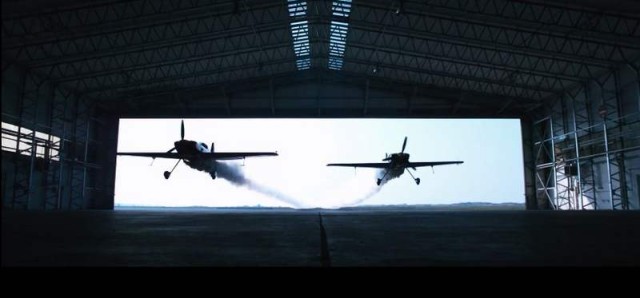 Two Planes Fly through a Hangar