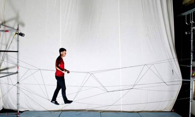 Drones build a walkable rope bridge