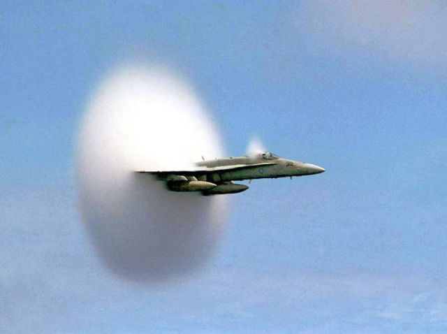 F/A-18 Hornet aircraft speeds up to supersonic speed