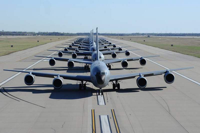 14 KC-135 tankers performing an Elephant Walk