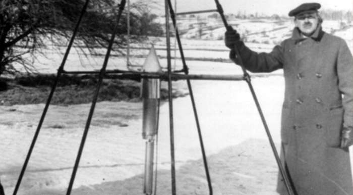 Dr. Robert H. Goddard and a liquid oxygen-gasoline rocket