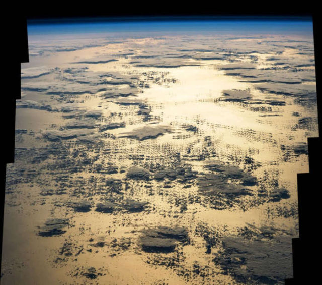 Morning Sun glint Over the Pacific