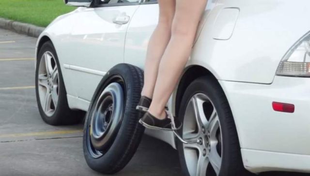 A Women's Guide to Changing a Tire 
