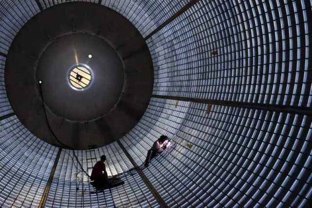 Plugging Away Inside Massive SLS Fuel Tank 1