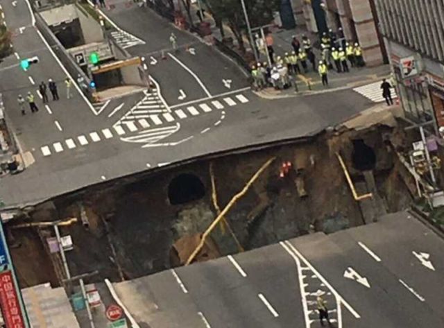 Huge Sinkhole swallows a large street in Japan 1