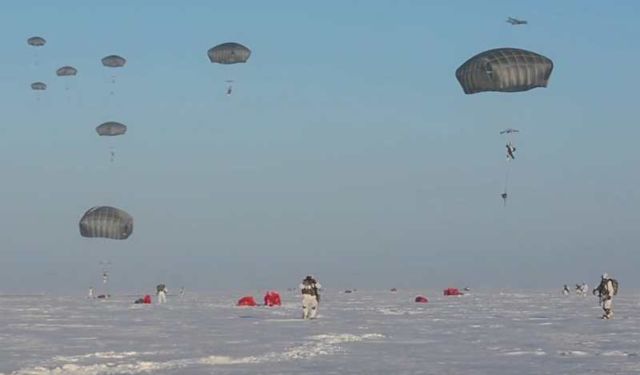American Paratroopers descend into the Arctic