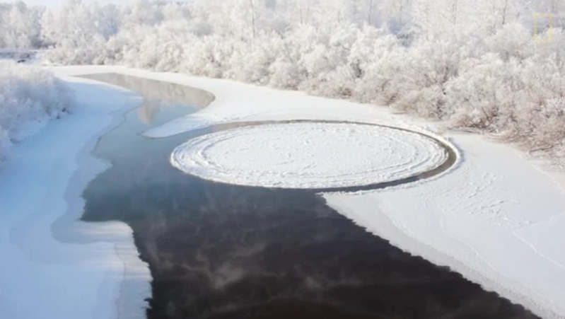 Giant, Spinning Ice Disk on River