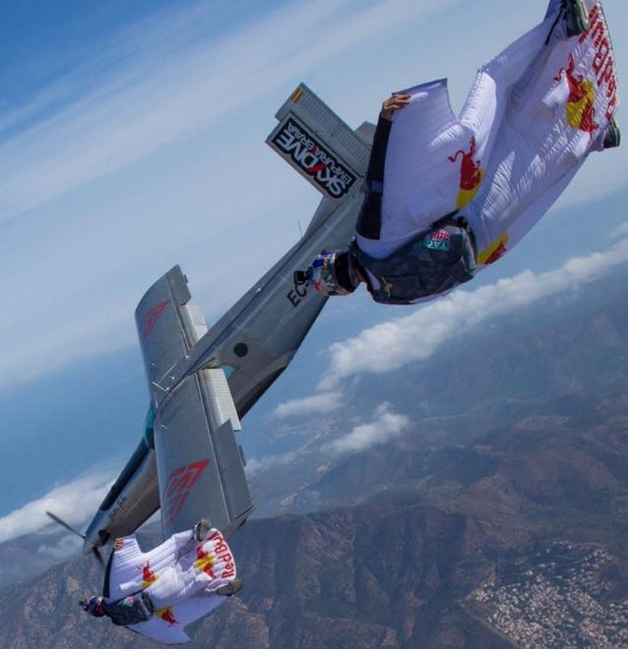 2 wingsuit flyers just BASE jumped into a plane