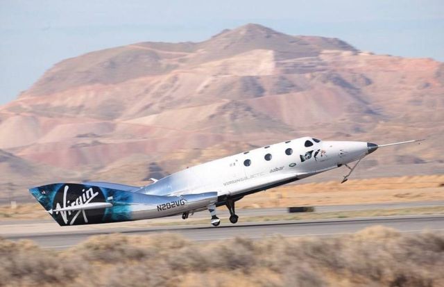 Virgin Galactic spaceplane completes rocket-powered flight (3)