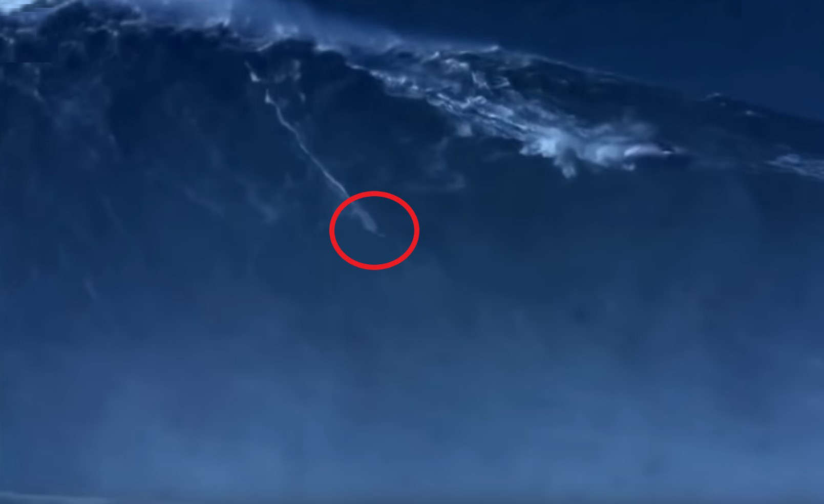 Surfer breaks world record by riding 80-foot wave
