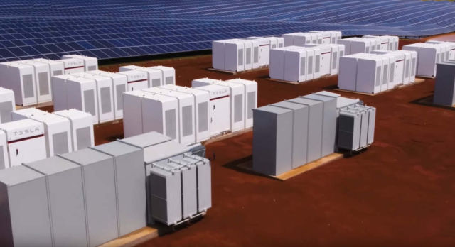Why Tesla is building city-sized batteries