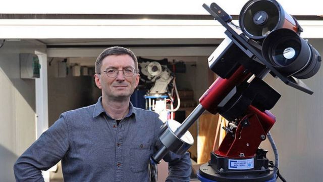 Professor Hakan Kayal next to the moon telescope