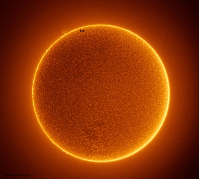 The Space Station Crosses a spotless Sun 