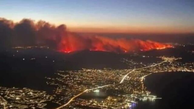 Wildfires rage across Athens